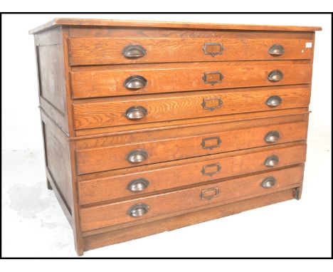 An early 20th century 1940's vintage industrial oak 8 drawer large architects plan chest of drawers. The large, wide and deep