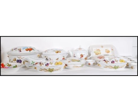 A good collection of Royal Worcester ' Evesham ' pattern ceramics to include teapot, tureens, gravy boat, serving dishes, ser
