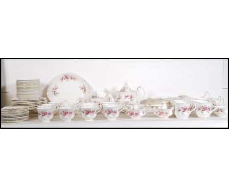 An extensive Royal Albert Lavender Rose tea / dinner service decorated with pink roses and purple foliage to include tea pot,