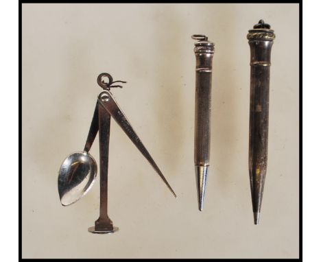 A silver hallmarked propelling pencil having engine turned decoration. Hallmarked for Birmingham date letter P 1964. Gross we