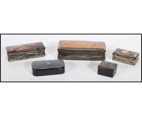 A selection of 19th Century snuff and patch boxes to include three boxes of rectangular form constructed from horn, two havin
