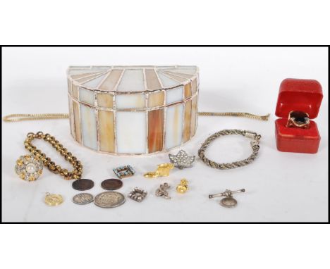 A small collection of vintage costume jewelry to include rings, bracelets, necklace, small brooches. Together with two gold t