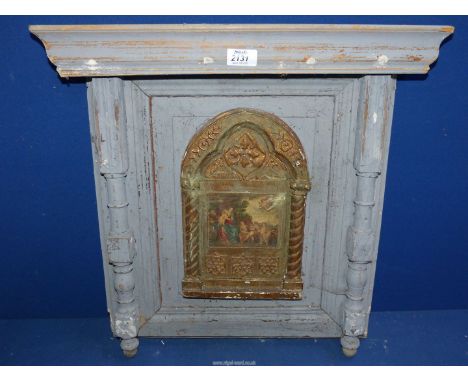 A Renaissance style print with gold highlights in a wooden surround.