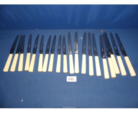 A quantity of Garrard & Co. knives, ten dinner and ten smaller.