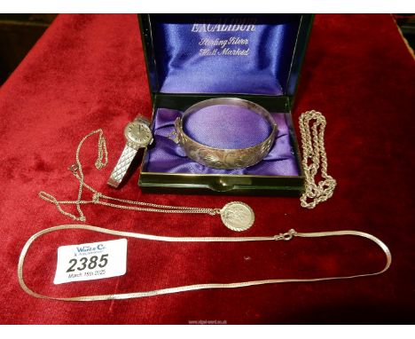A small quantity of jewellery including a Silver bangle, Silver St Christopher pendant on a silver chain, Ladies Acurist wris