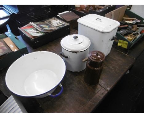 An assortment of enamel kitchenalia