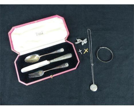 A HM silver Christening set of knife (with pitch filled handle), fork and spoon, inscribed "V.A.C." overall weight 90g; with 