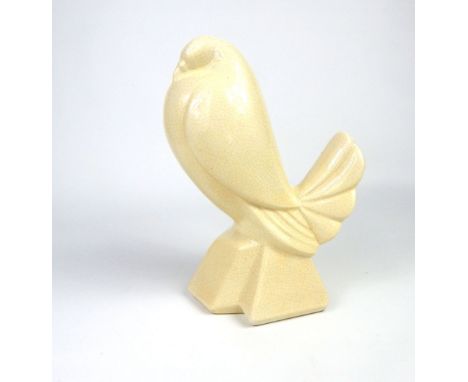 A crackle-glazed Art Deco style ceramic figurine of a Dove seated upon its perch; 21cm high.