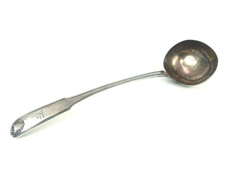 A large hallmarked silver ladle with reeded-edge detail and scallop shell motif on the front and reverse of the handle, gener