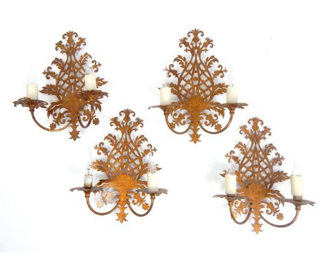 A set of four brushed gilt metal twin branch wall light fittings, with shaped wall mounts, 40cm high