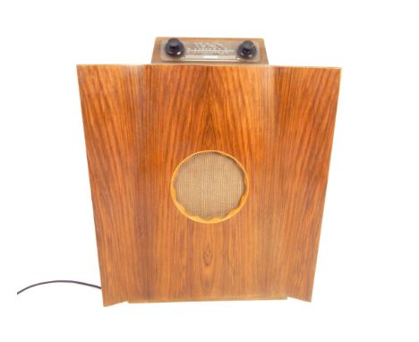 A vintage Murphy 146 'Batwing' radio, constructed with a walnut veneered case with a central speaker by Celestion, valve oper