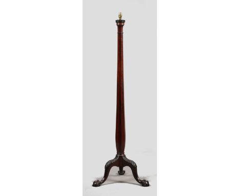 An Edwardian inlaid mahogany standard lamp with octagonal pedestal raised on a tripod base with claw terminals, 156cm. Condit