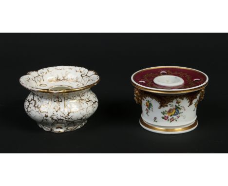 A Rockingham inkwell with shell moulded C scroll rim decorated with a seaweed pattern in gilt and a similar inkwell with clar