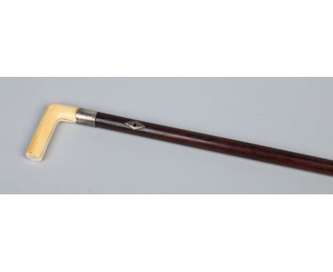 A Victorian hardwood walking stick with silver collar and carved ivory grip, 93cm.  Condition Report. To be used as a guide o