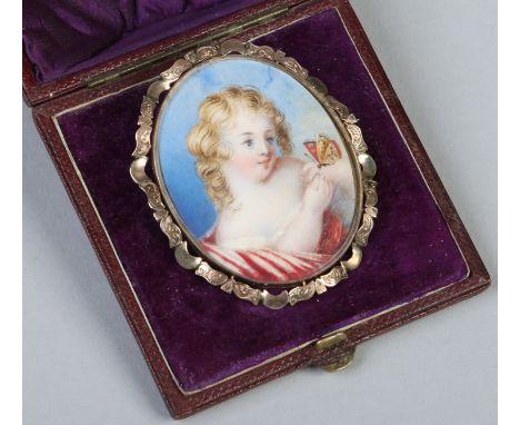 A Victorian pinchbeck brooch in fitted leather case. Set with an ivory portrait miniature of a young girl with a butterfly un