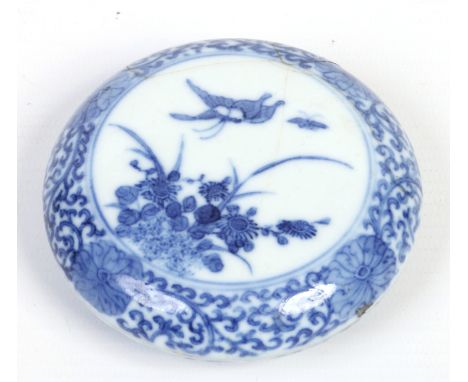 A Chinese paste pot decorated in underglaze blue under a lotus scroll border with flowers and butterflies. Qianlong square se