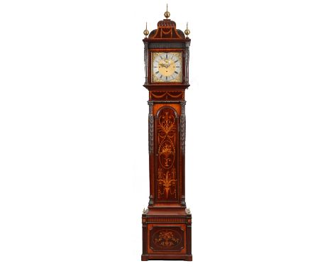 A fine Victorian mahogany marquetry longcase clock of tall proportions by Maple & Co. London. With fluted caddy top having br