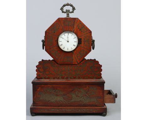 A Regency rosewood table clock with single side drawer and brass inlay depicting an equestrian scene. Housing a French eight 