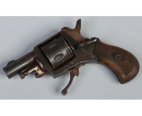 A de activated nine shot revolving pocket pistol with carved scales, barrel length 4cm. Condition Report. To be used as a gui