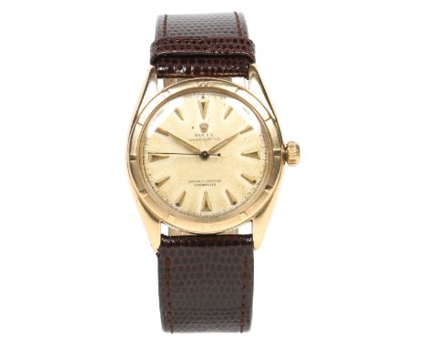 A gentleman's 18ct gold cased Rolex Oyster Perpetual wristwatch c1950s. With screw back and screw down crown, having satin di
