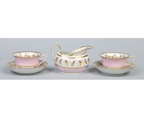 A Worcester Flight, Barr & Barr milk jug and pair of teacups and saucers. Decorated with pink ground bands and gilded with tr