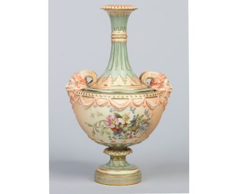 A Victorian Royal Worcester Classical style pedestal vase. With blush and sage ground, with moulded satyr handles and ribbon 