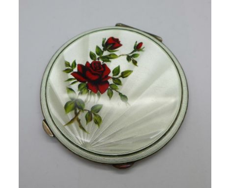 A silver and enamel compact, enamel scratched, 137g 