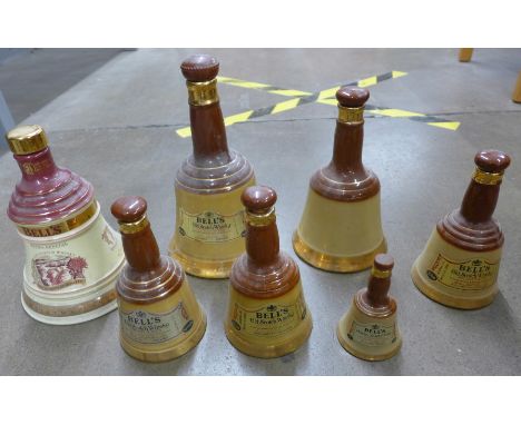 A collection of seven Wade Bells Scotch Whisky decanters, lacking contents **PLEASE NOTE THIS LOT IS NOT ELIGIBLE FOR POSTING