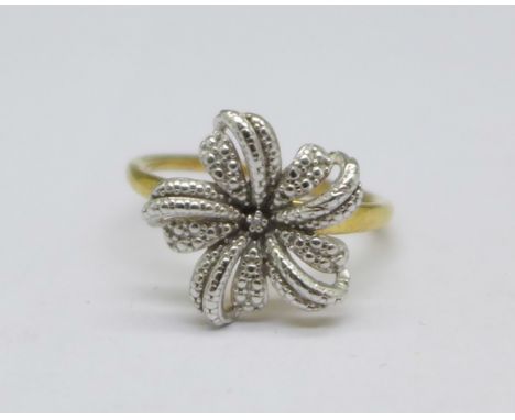 A silver gilt ring with central diamond accent, O 