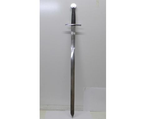 A replica or re-enactment sword, lacking scabbard, blade 76cm 