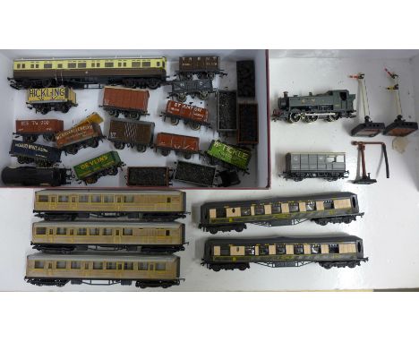A collection of OO gauge model railway, one Lima locomotive, Horny and Peco carriages and wagons 