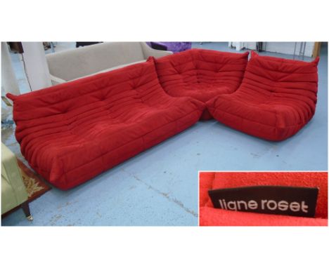 TOGO SOFA,by Michel Ducaroy for Ligne Roset, in red upholstery, three sections, one three seater sofa, a single chair and a s