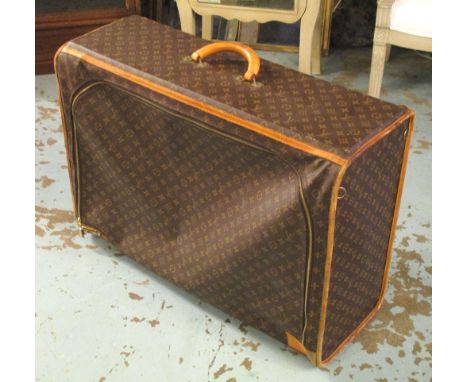 LOUIS VUITTON SUITCASE, monogrammed overall with zip side, 59cm x 81cm x 31cm. (with faults)