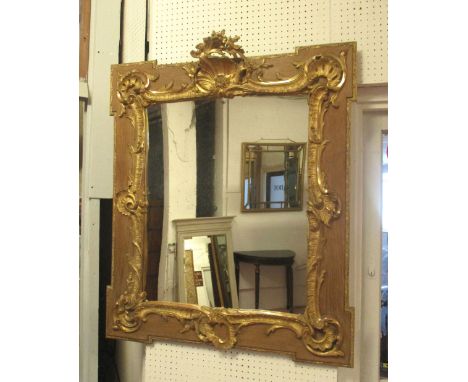 WALL MIRROR, 18th century style giltwood and composition with shell C scroll and oak panel frame, 102cm H x 84cm W.