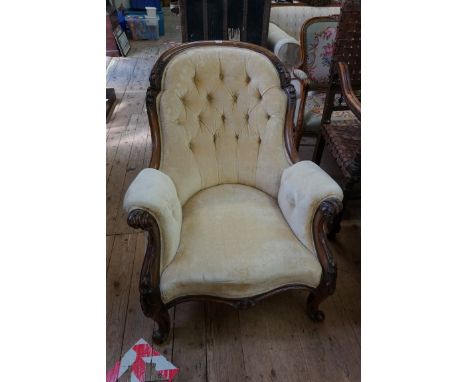 A good 19th century carved walnut and button upholstered occasional armchair.&nbsp; 