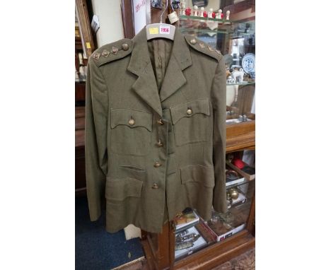 A 1943 British Army Dental Corps captain's dress jacket, by Hawes Bros. 