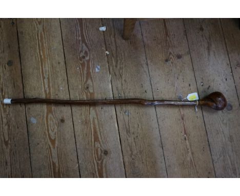 Ethnographica:&nbsp;a knobkerrie stick or cane, 81.5cm long. 