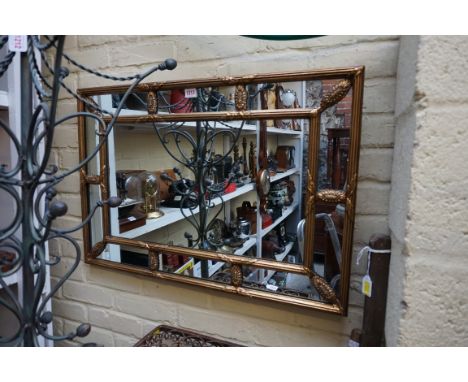 A reproduction gilt framed rectangular wall mirror, 55 x 81.5cm.&nbsp; 
