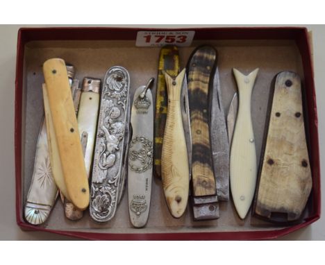 A small group of penknives, to include two silver and mother-of-pearl examples; a 1902 coronation example; a fish form exampl