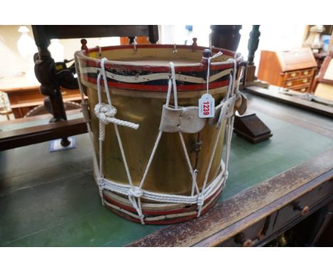 An antique brass military style drum, possibly French, 40cm high. 