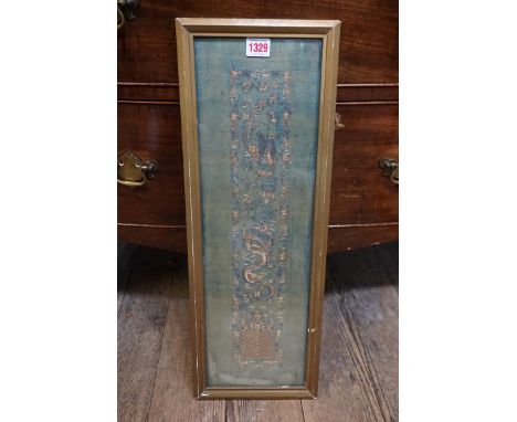 A Chinese silver and gold thread embroidered dragon and phoenix panel,&nbsp;54 x 16.5cm.&nbsp; 