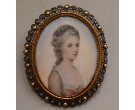 European School, early 20th century, a bust length portrait miniature of a lady, indistinctly signed, 8.2 x 6.3cm oval, in a 