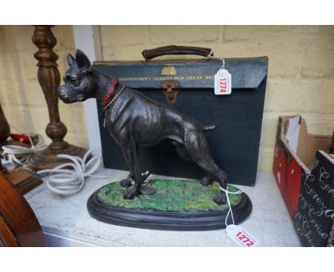 A bronze Boxer dog, 24.5cm high. 