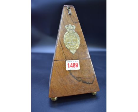 A walnut Maelzel metronome.&nbsp; 