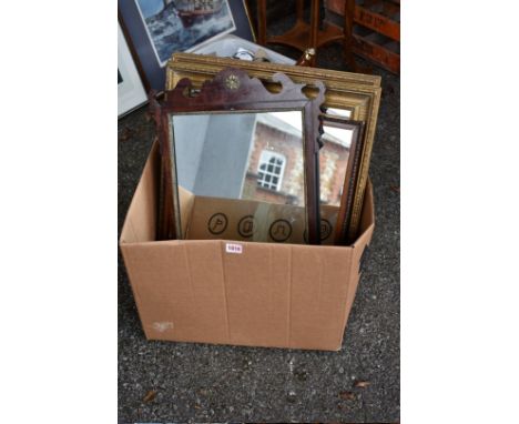 Two gilt wall mirrors; together with a fretwork mirror and one other. 