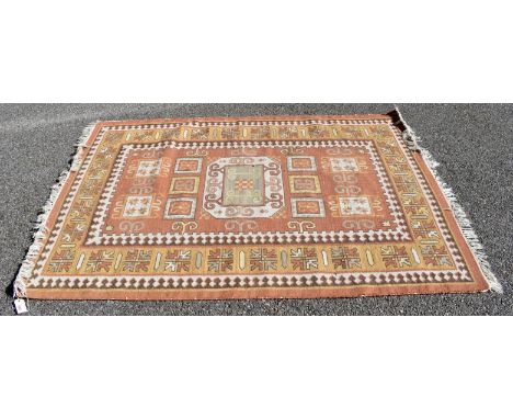 A Persian rug,&nbsp;with geometric design to central field and geometric borders, 198 x 142cm.&nbsp; 