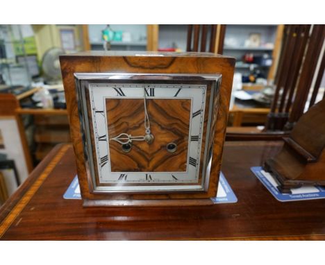 A circa 1930 walnut mantel clock,&nbsp;19cm wide, with pendulum. 