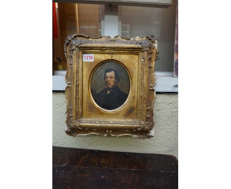 English School, mid 19th century, head and shoulder portrait of a gentleman, oil on board, 14 x 11.5cm oval. 
