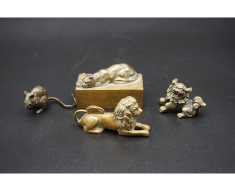 A small bronze recumbent lion, 8cm long; together with a Chinese bronze lion dog or shishi, 5.5cm long; a bronze rat, 6cm lon