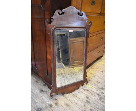 An 18th century mahogany fret framed wall mirror,&nbsp;92.5 x 50.5cm. 